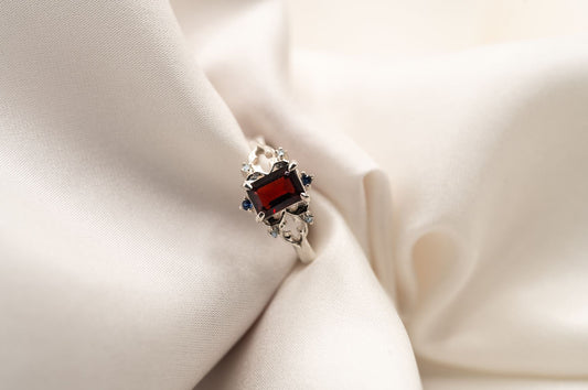 Emily St. Aubert Ring | Red Emerald-cut Garnet and blue sapphires | Silver | Size 6